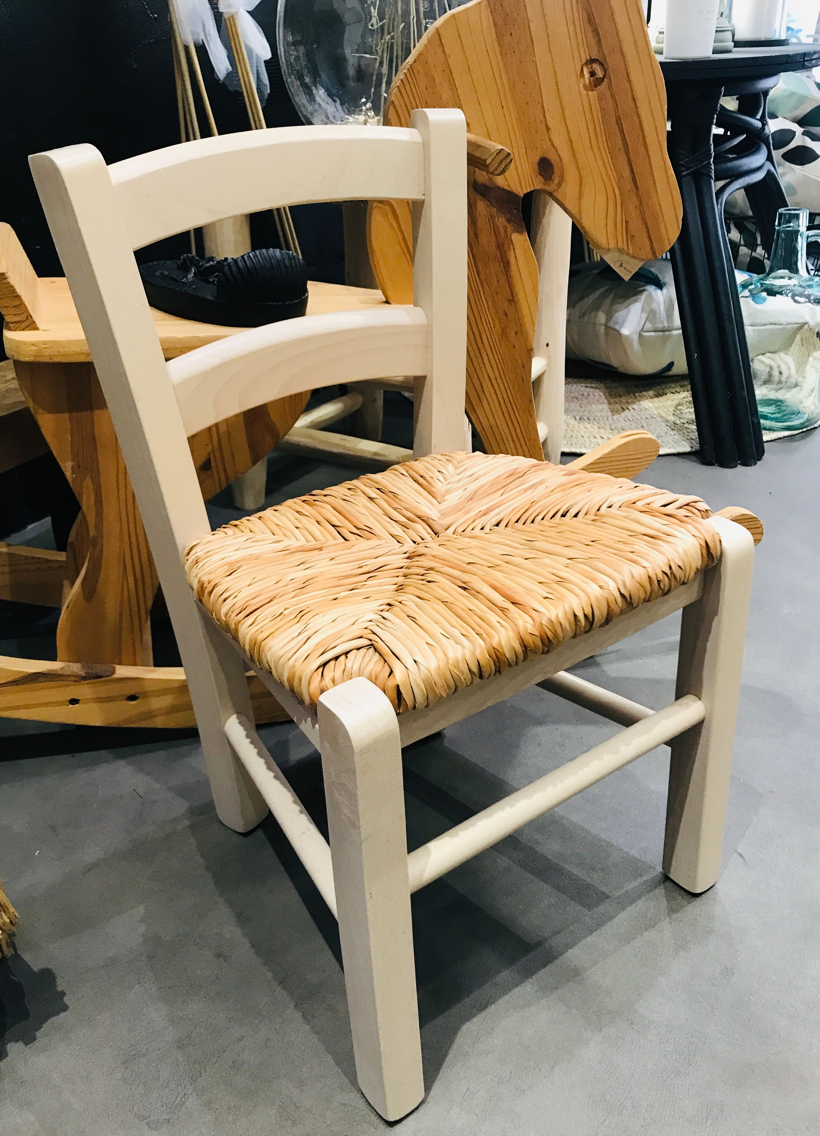 Straw seated wooden chair