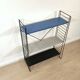 Mid century free standing rack with metal shelves by A. Dekker for Tomado