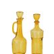 Set of two vintage amber glass carafes attributed to Lubiana.