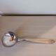 Silver-plated metal ladle, art deco motif.
