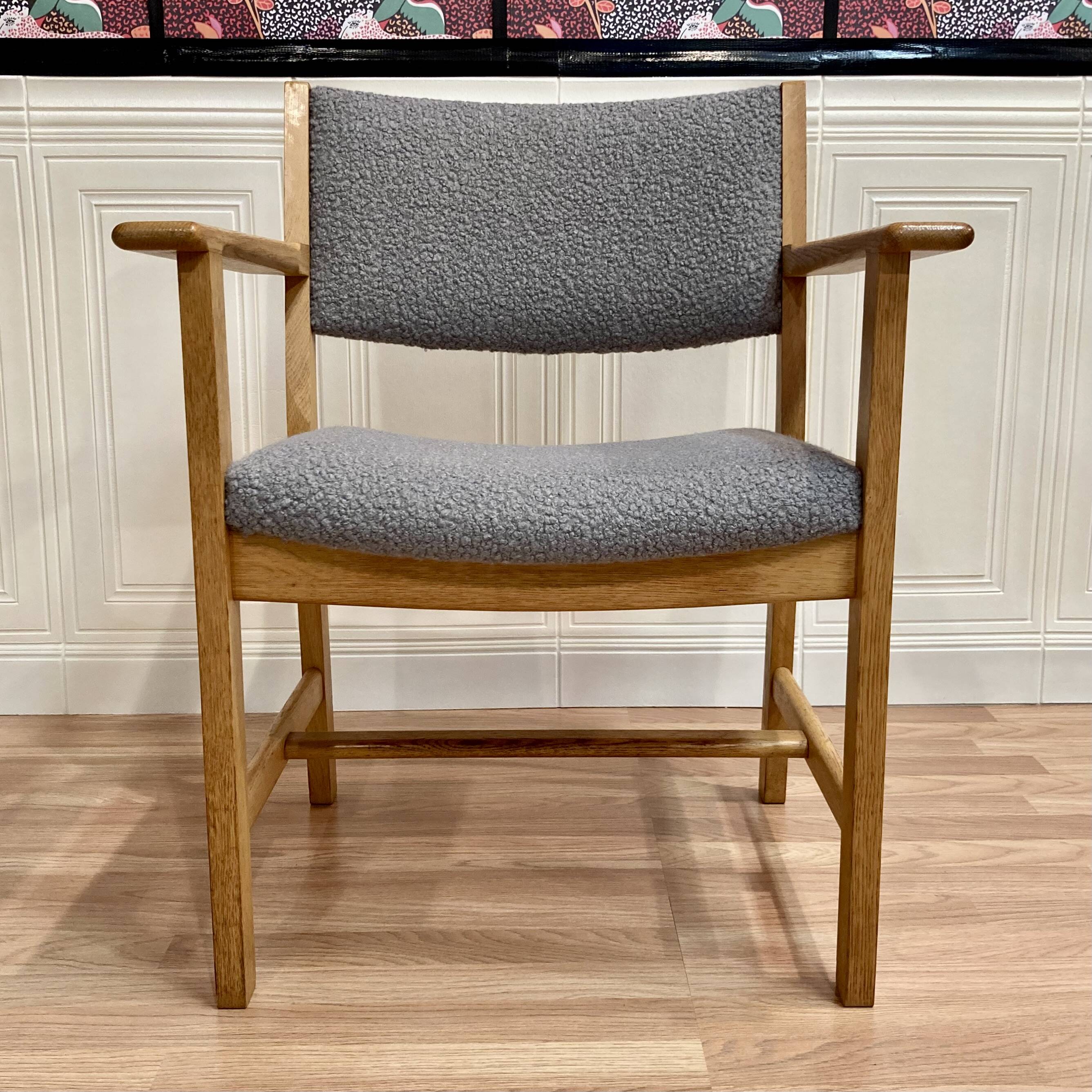 A pair of armchairs stamped "hans wegner" 1960.