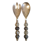 Antique silver-plated metal cutlery with blown glass beads