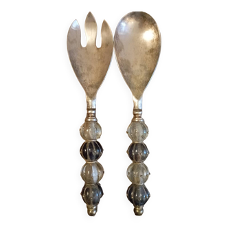 Antique silver-plated metal cutlery with blown glass beads