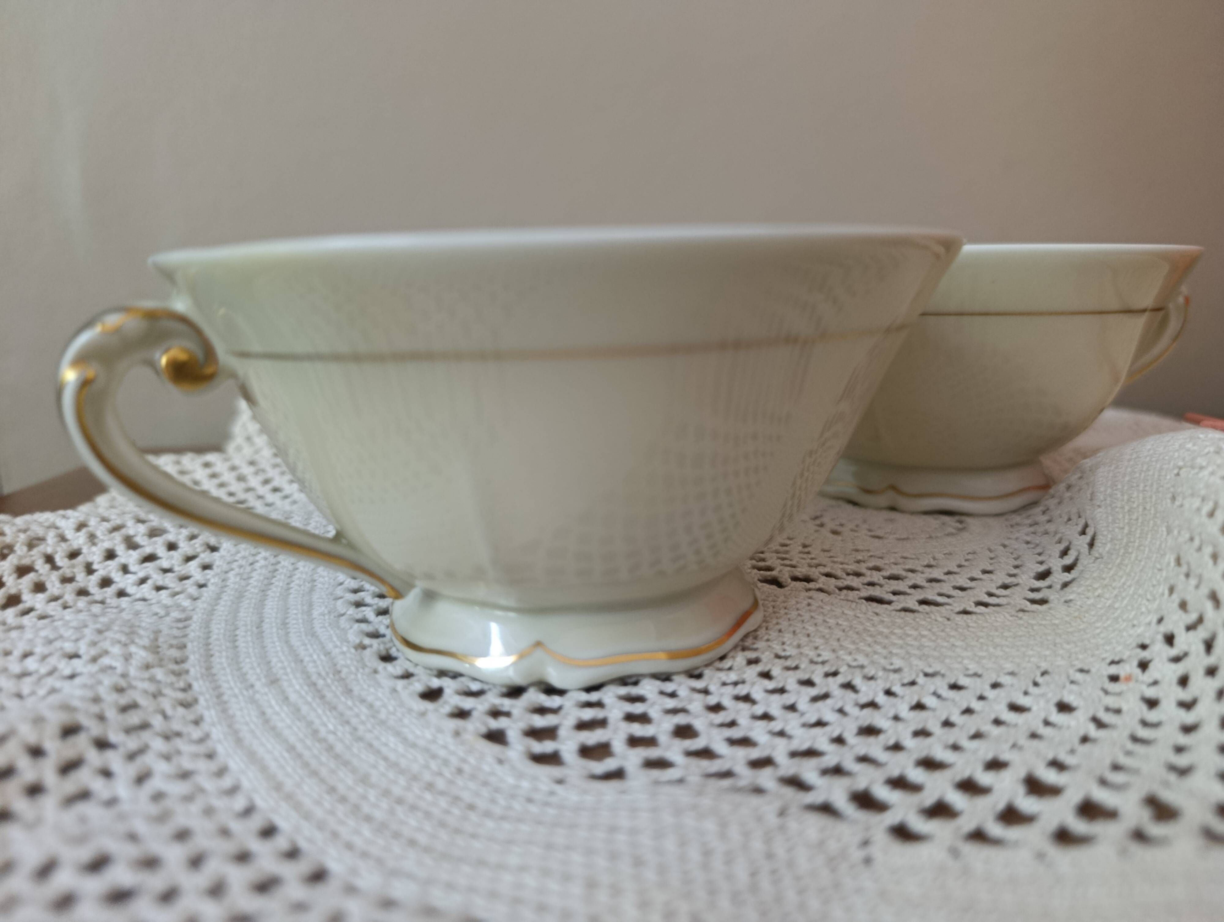Two retro country-style porcelain tea cups, Former Royal Manufacture