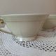 Two retro country-style porcelain tea cups, Former Royal Manufacture