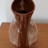 Brown painted earthenware pitcher