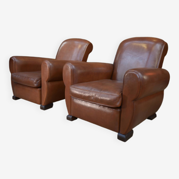 Pair of 1960s club armchairs in brown leather