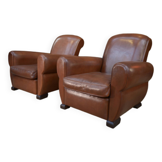 Pair of 1960s club armchairs in brown leather