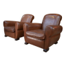 Pair of 1960s club armchairs in brown leather