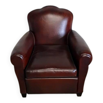 Club chair with floral backrest