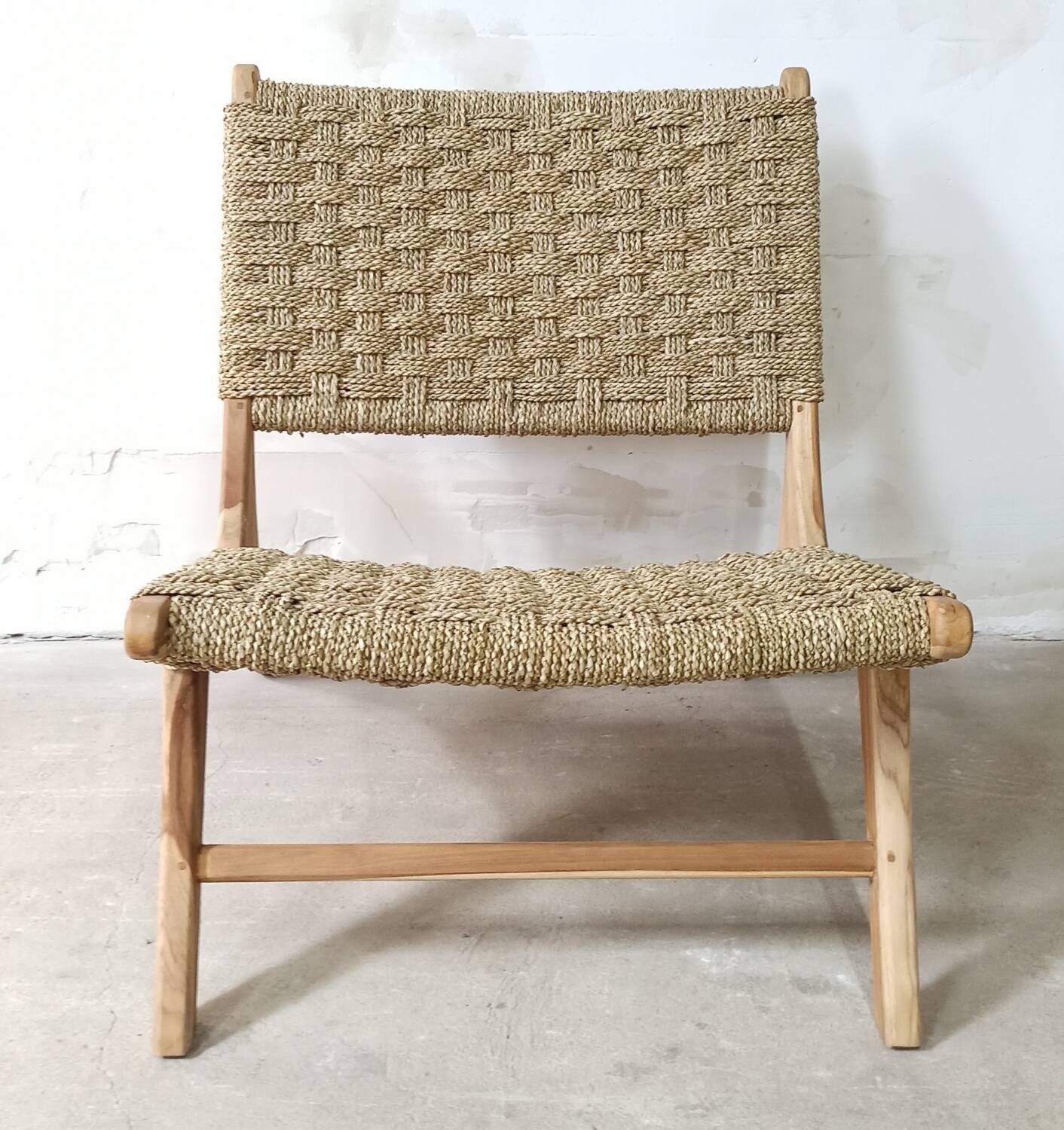 Pair of low armchairs in wood and woven rattan