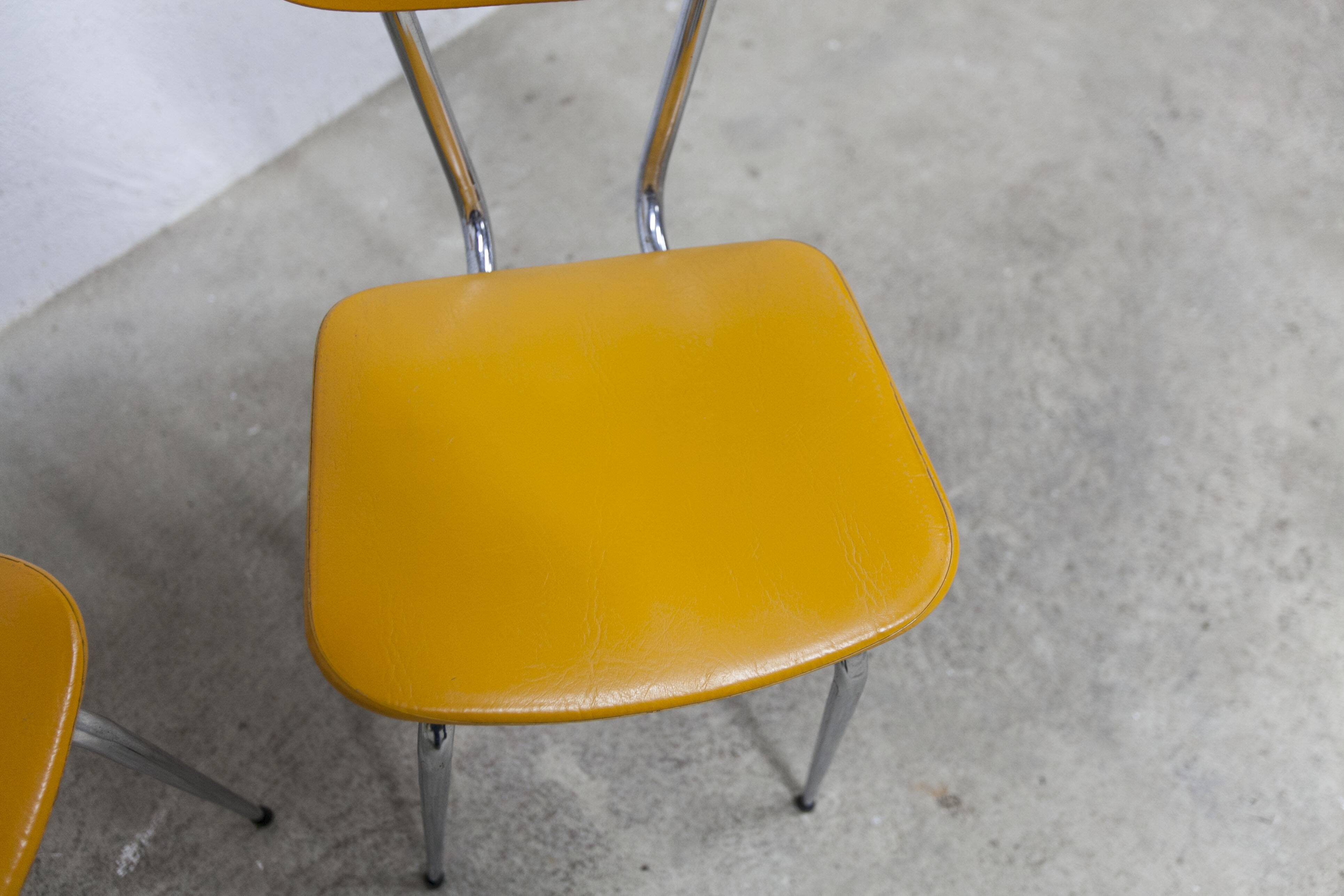 Pair of mustard-colored 70s welded Skai chairs