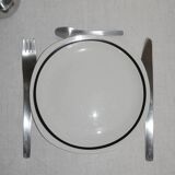 5 black and white square plates