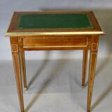 Louis XVI writing table with brass beading