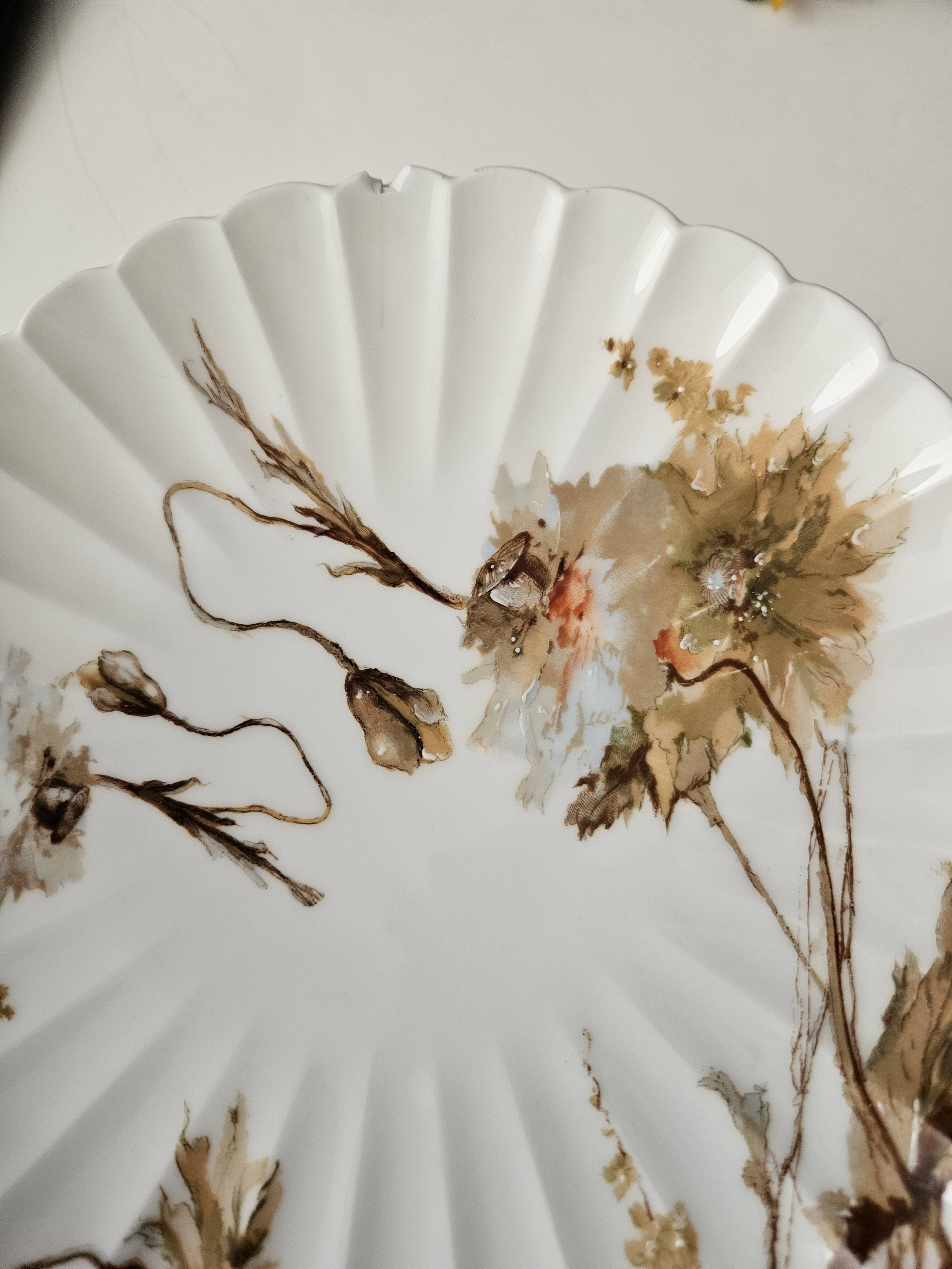 Haviland service plates, dishes on pedestals and soup tureen