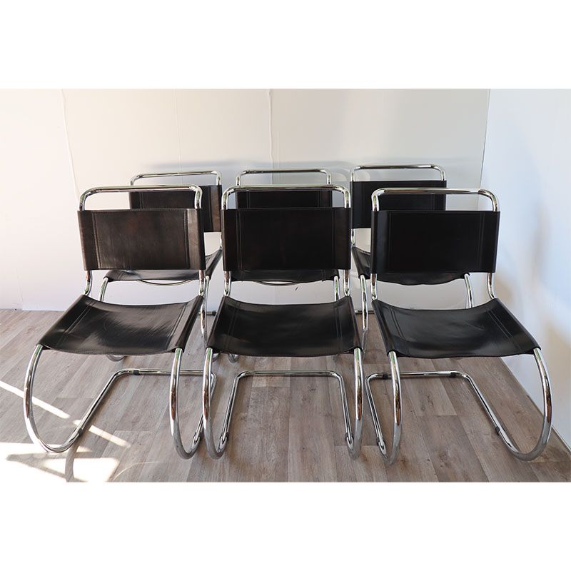 Series of 6 minimalist chairs in chrome metal and black leather around 1970