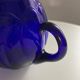 Vintage cobalt blue glass pitcher by Henry Dean