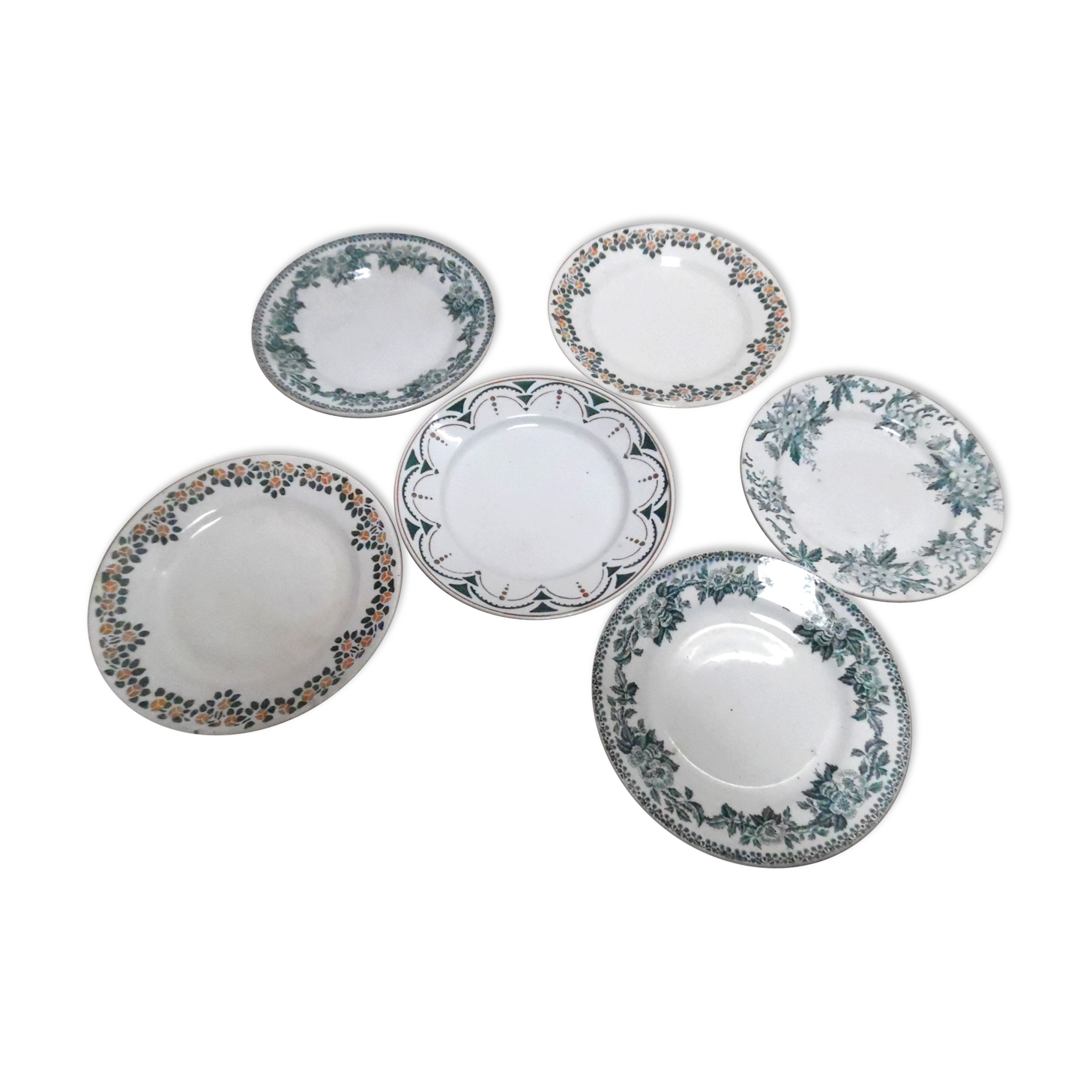 six plates mismatched earthenware