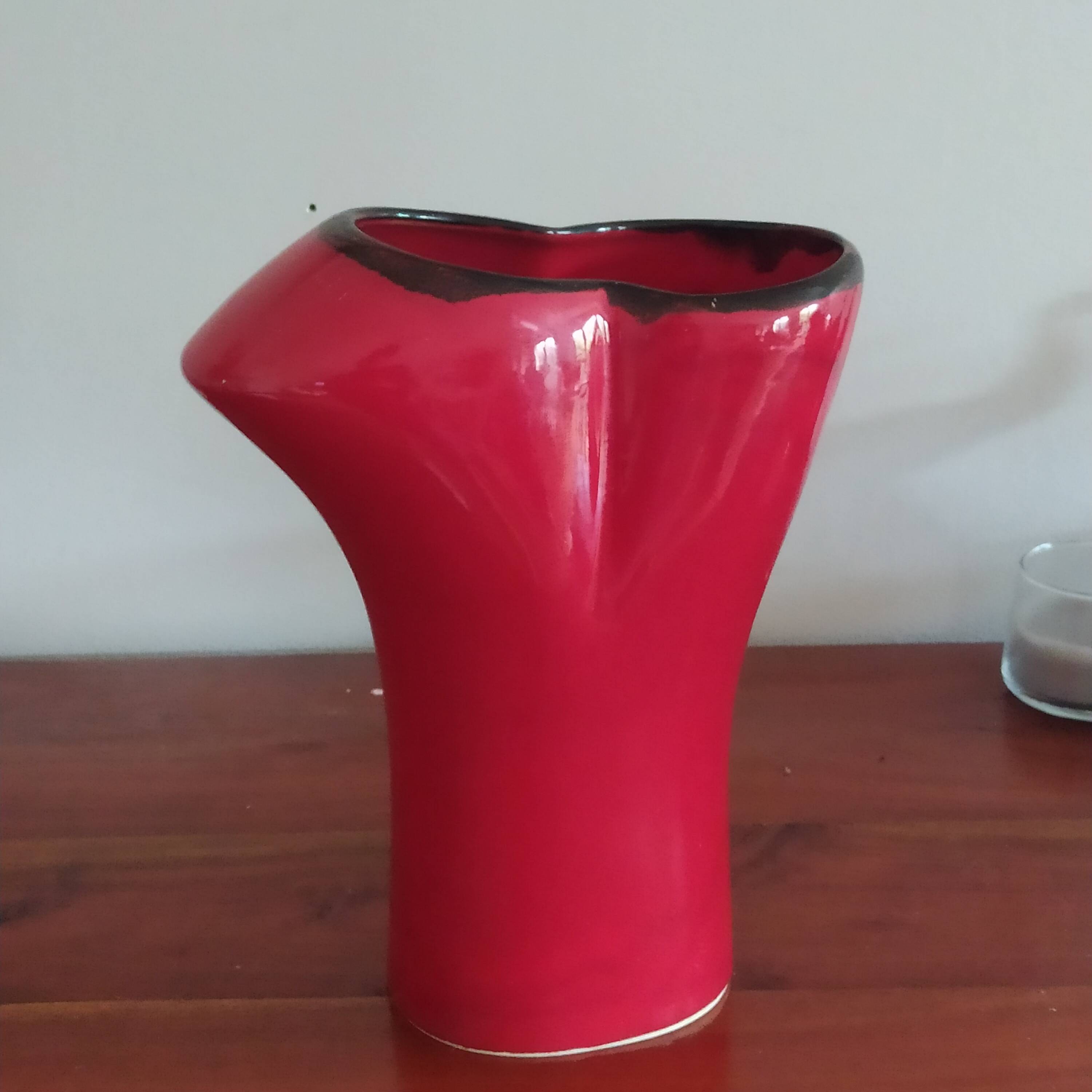 red ceramic designer vase by Les Grottes de Dieulefit