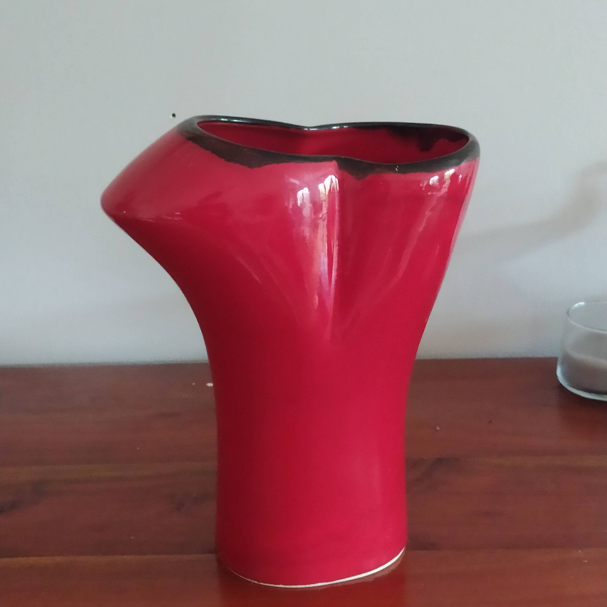red ceramic designer vase by Les Grottes de Dieulefit