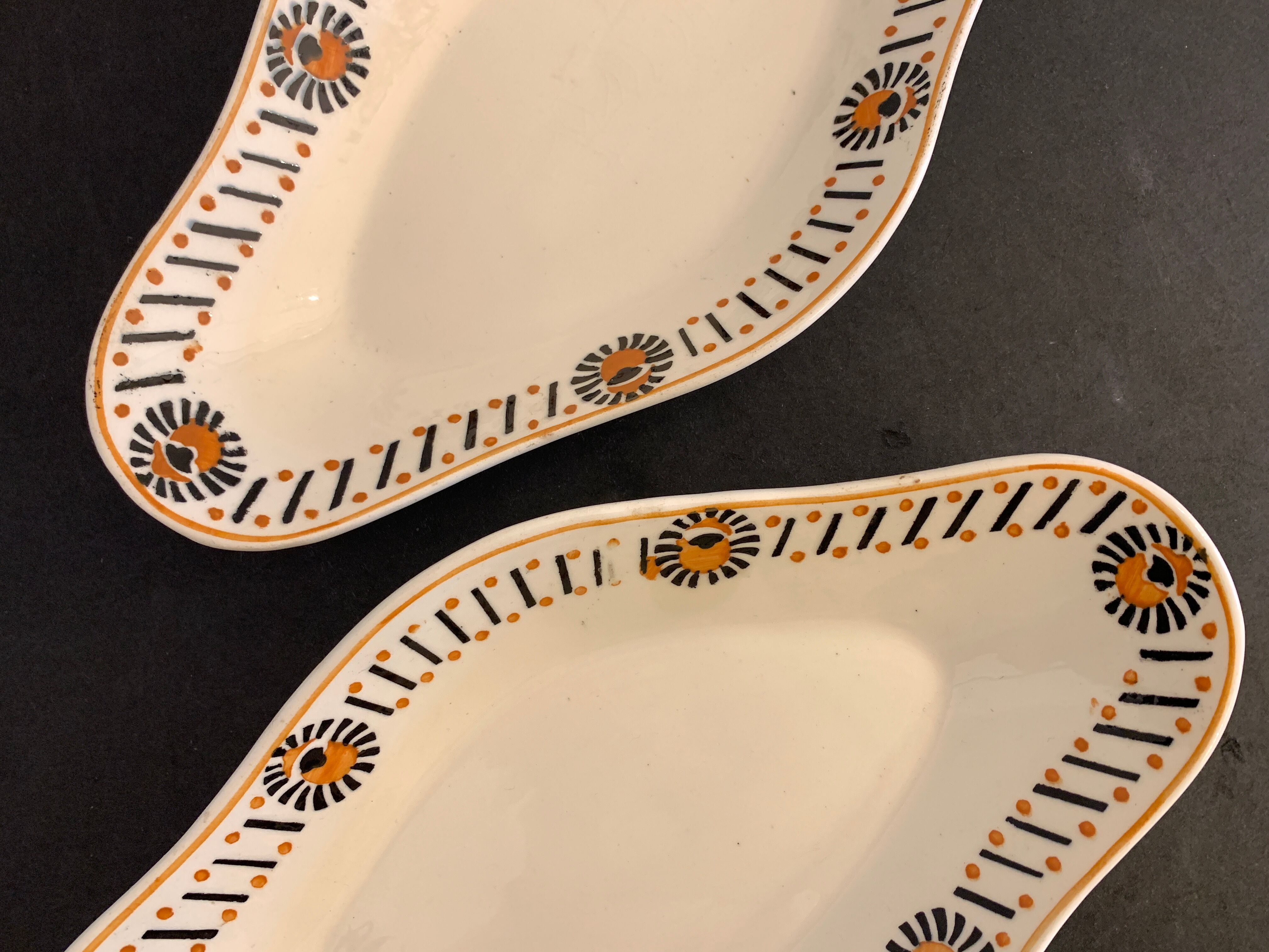 Pair of art deco raviers signed Longwy and numbered, model Gerazine