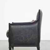 Black Art Deco design cow leather and wooden armchair with loose cushion