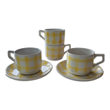 4 cups, 2 under cups yellow and white tea towel pattern