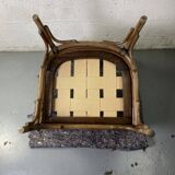 Colonial armchair in wood and canework