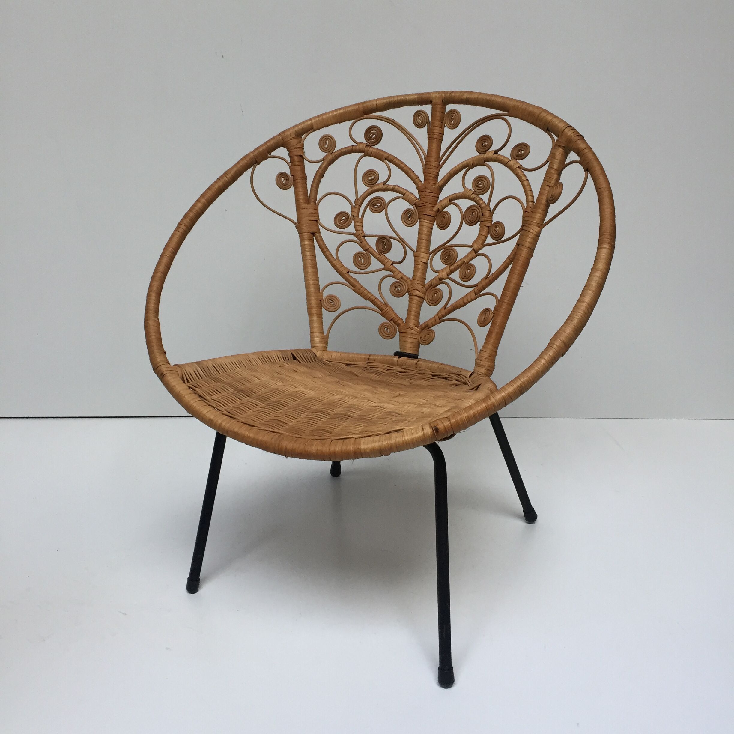 Vintage Bohemia volutes rattan chair