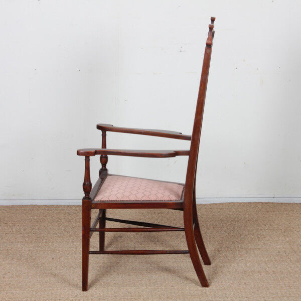 English armchair attributed to J.S. Henry, late 19th century.