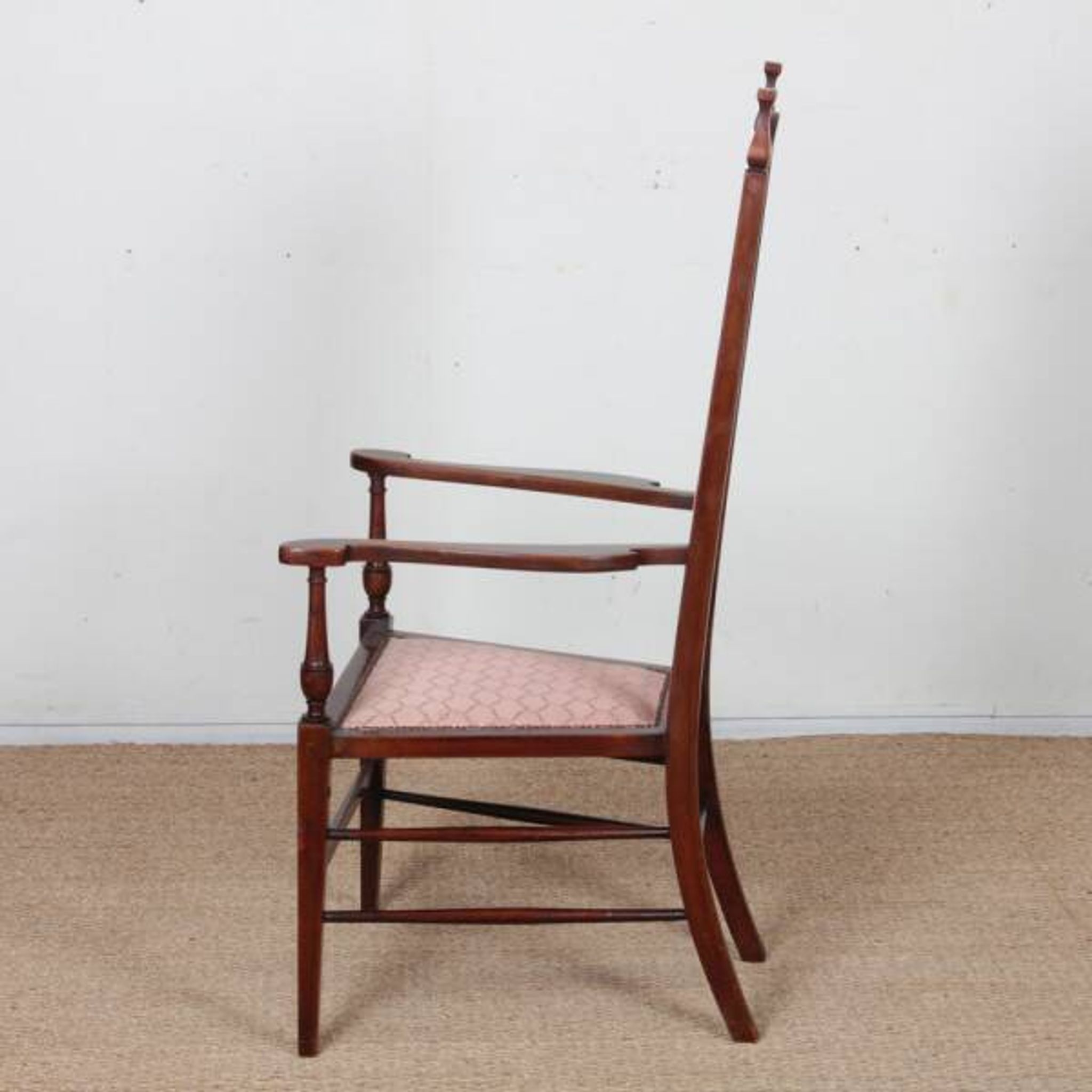 English armchair attributed to J.S. Henry, late 19th century.