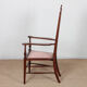 English armchair attributed to J.S. Henry, late 19th century.