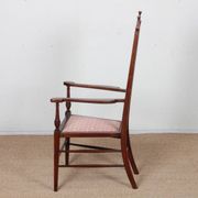 English armchair attributed to J.S. Henry, late 19th century.
