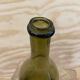 Bouteille en verre verte ancienne Wabi Sabi