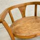Old armchair for children in wood