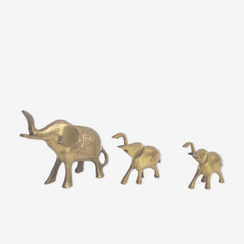 Three brass elephants