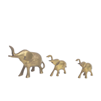 Three brass elephants