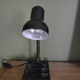 Black flexible desk lamp with built-in flashheld