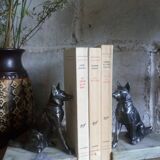 Pair of Art Deco bookends to signed wolf dogs