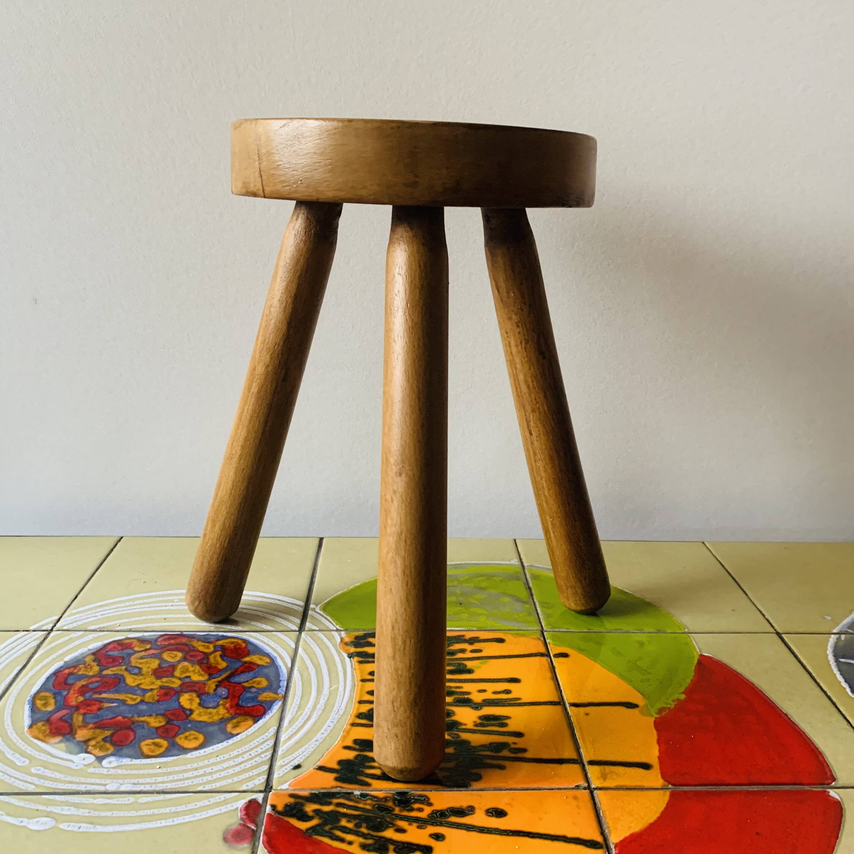 Small tripod stool in solid wood