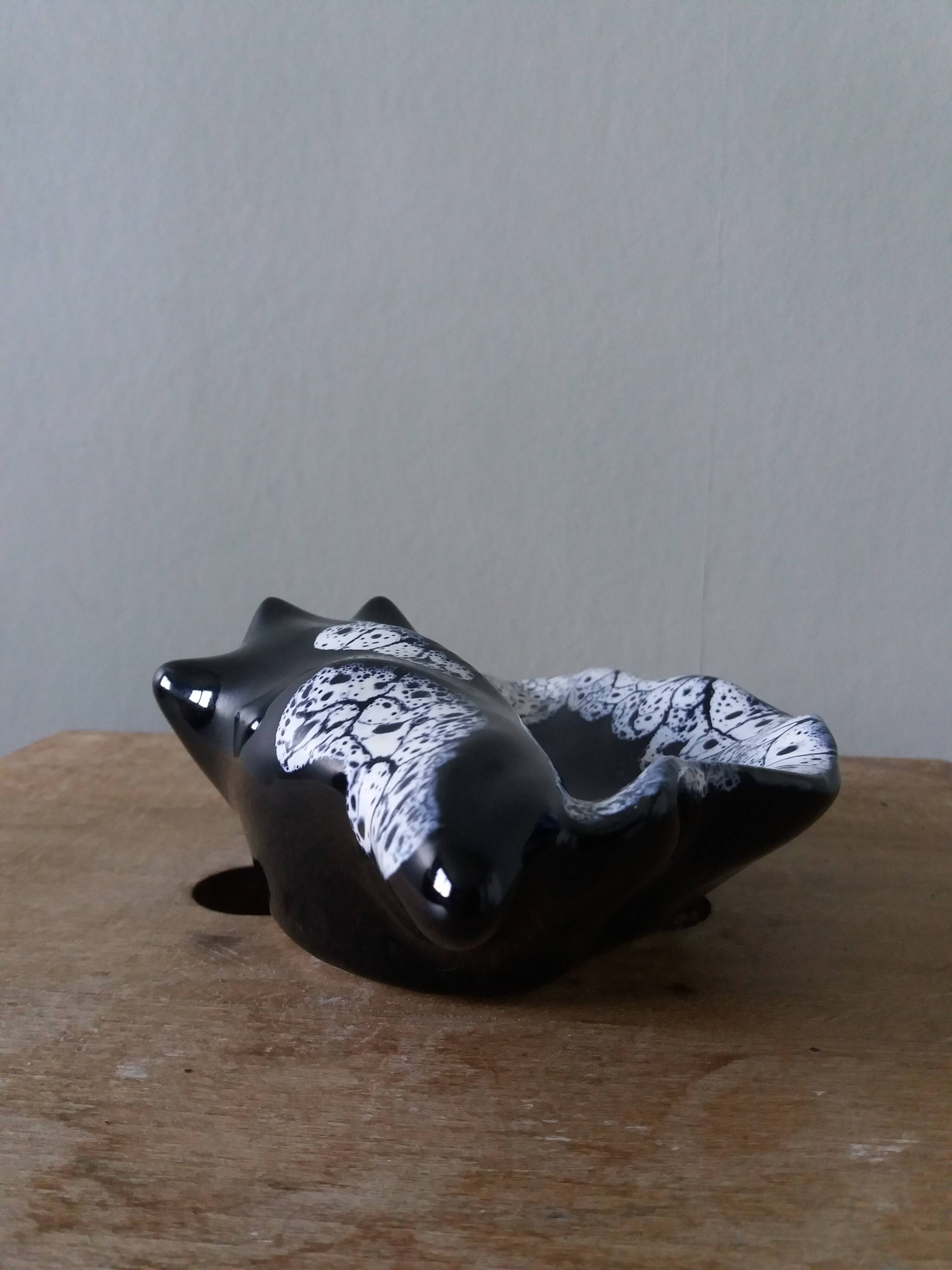 Black ceramic and foam shell ashtray