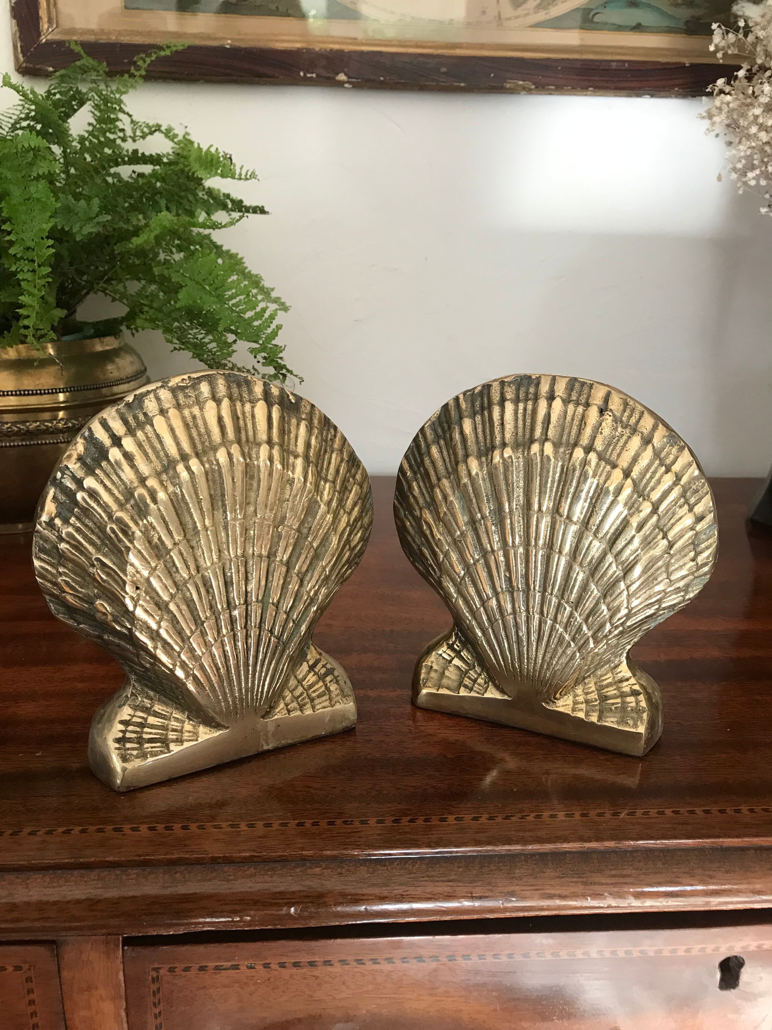 Pair of brass shell book clamps