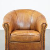 Fauteuil club en cuir de mouton patiné couleur cognac