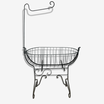 Former cradle in wrought iron