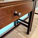 Pair of walnut bedside tables designed by Jacques Hauville for Roche Bobois.