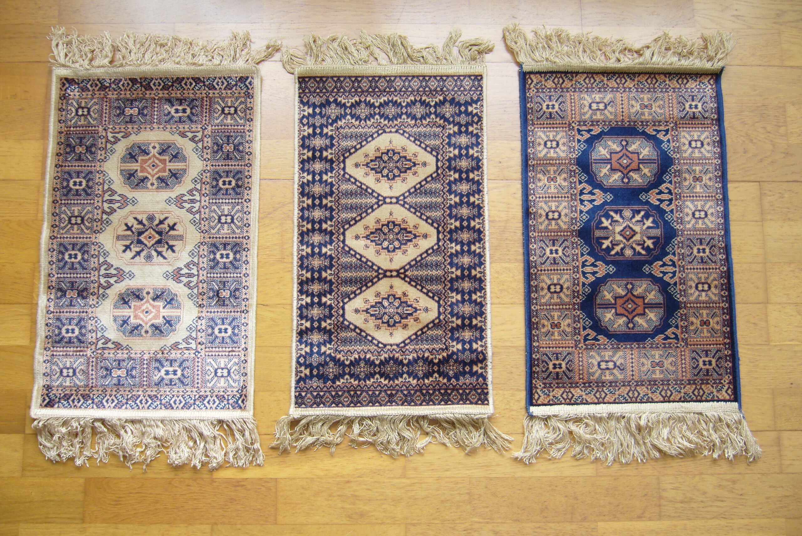 Three oriental rugs 35 x 70 cm
