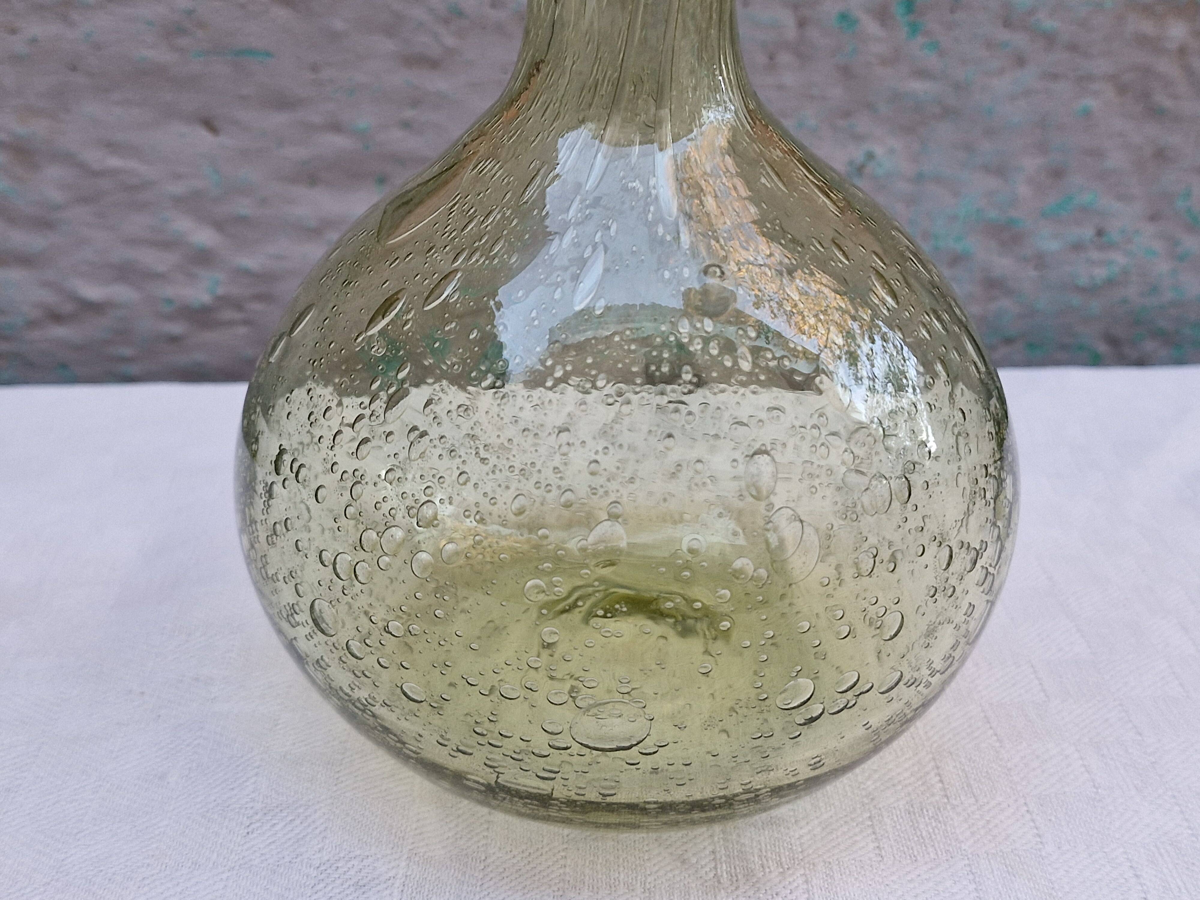 Vintage carafe signed Biot, blown glass, bubbled.