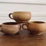 Three cups made of ancient sandstone