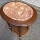 Oval Louis XVI gueridon carved in solid cherry wood with pink marble.