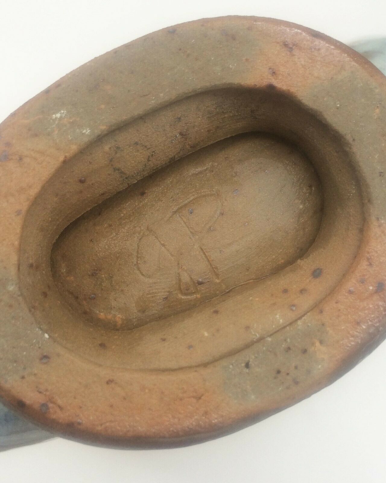 Vernified ceramic vase with handles